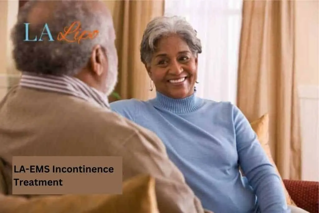 Couple sat smiling at each other - LA-EMS treatment Richmond