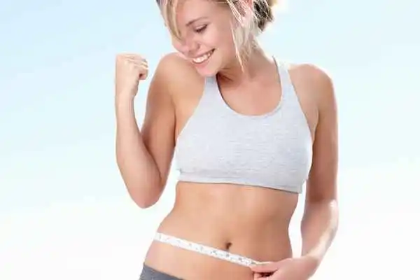 woman happy after fat reduction treatment Richmond